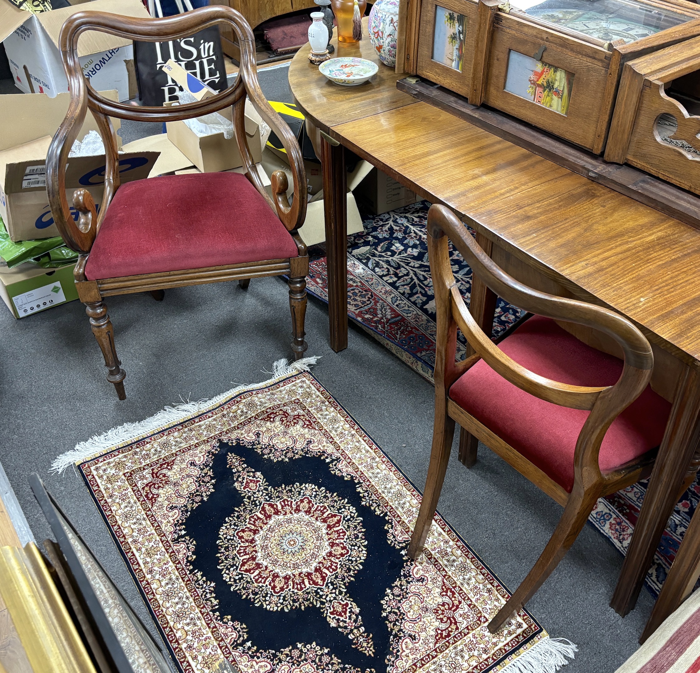 A set of six early Victorian rosewood dining chairs, two with arms